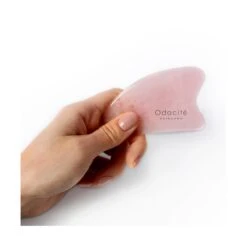 CRYSTAL CONTOUR GUA SHA - ROSE QUARTZ 7 CRYSTAL CONTOUR GUA SHA - ROSE QUARTZ -Omorovicza Shop Odacite crystal contour gua sha hand
